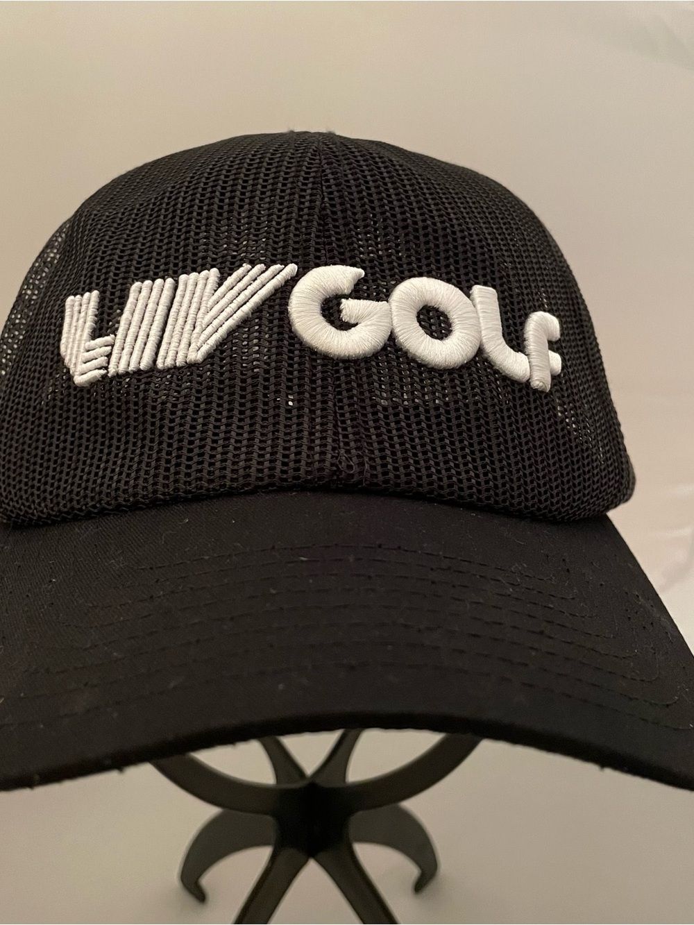 LIV  Golf Mesh Trucker Hat in Black and White